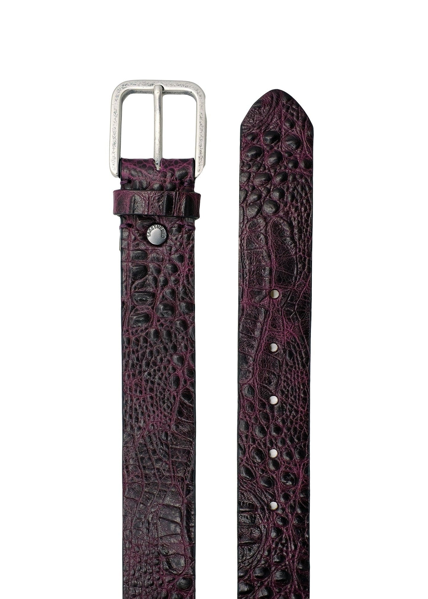 Top-down view of Dirty Aubergine alligator belt showing the weathered silver buckle and textured leather tip.