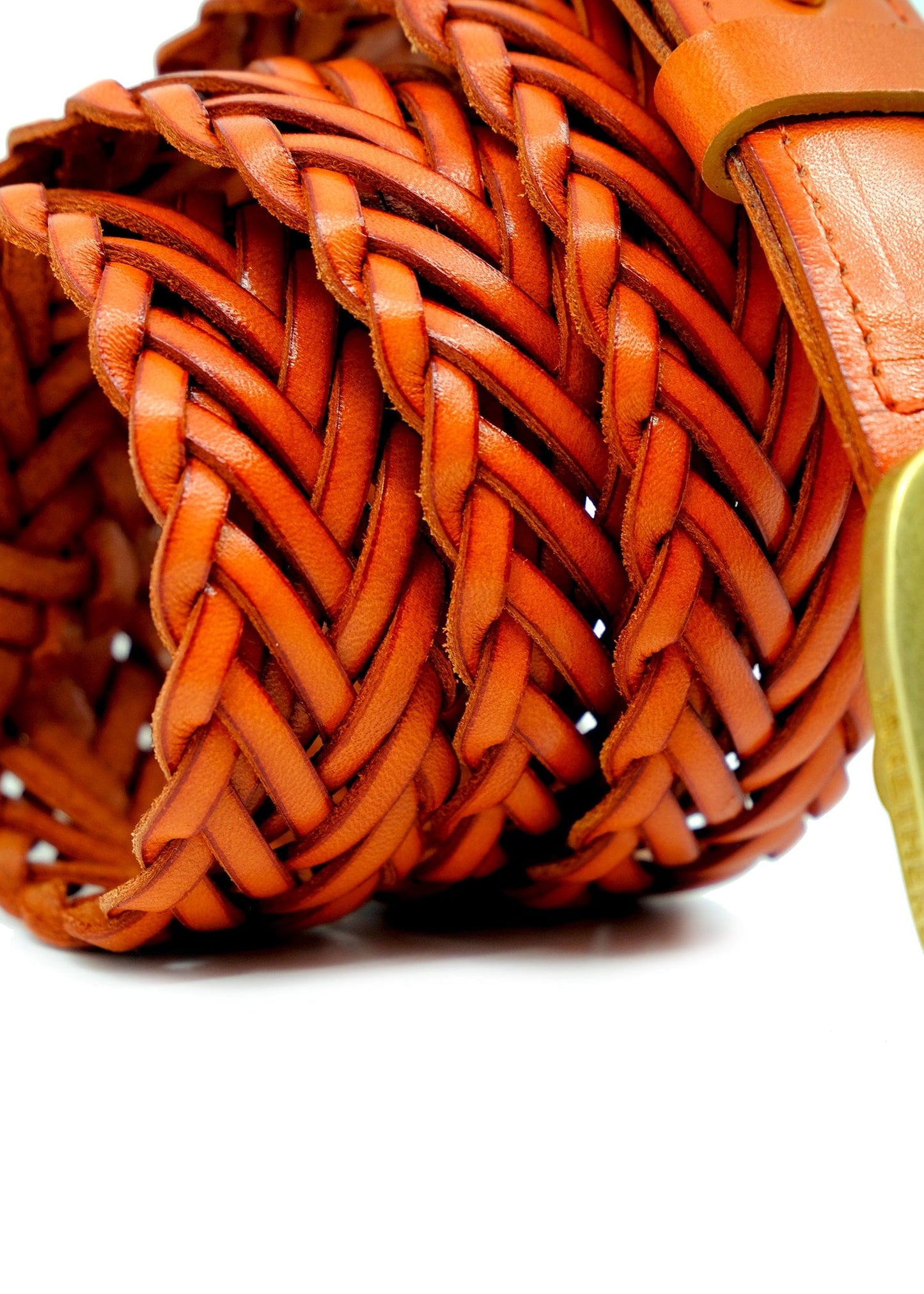 Macro shot of the Tatooine Sunset orange braided leather belt showing the intricate weave and vibrant color.