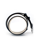 Side view of coiled Classic Pitch Black smooth leather belt with weathered silver buckle and "BIRD & ASH." engraving.