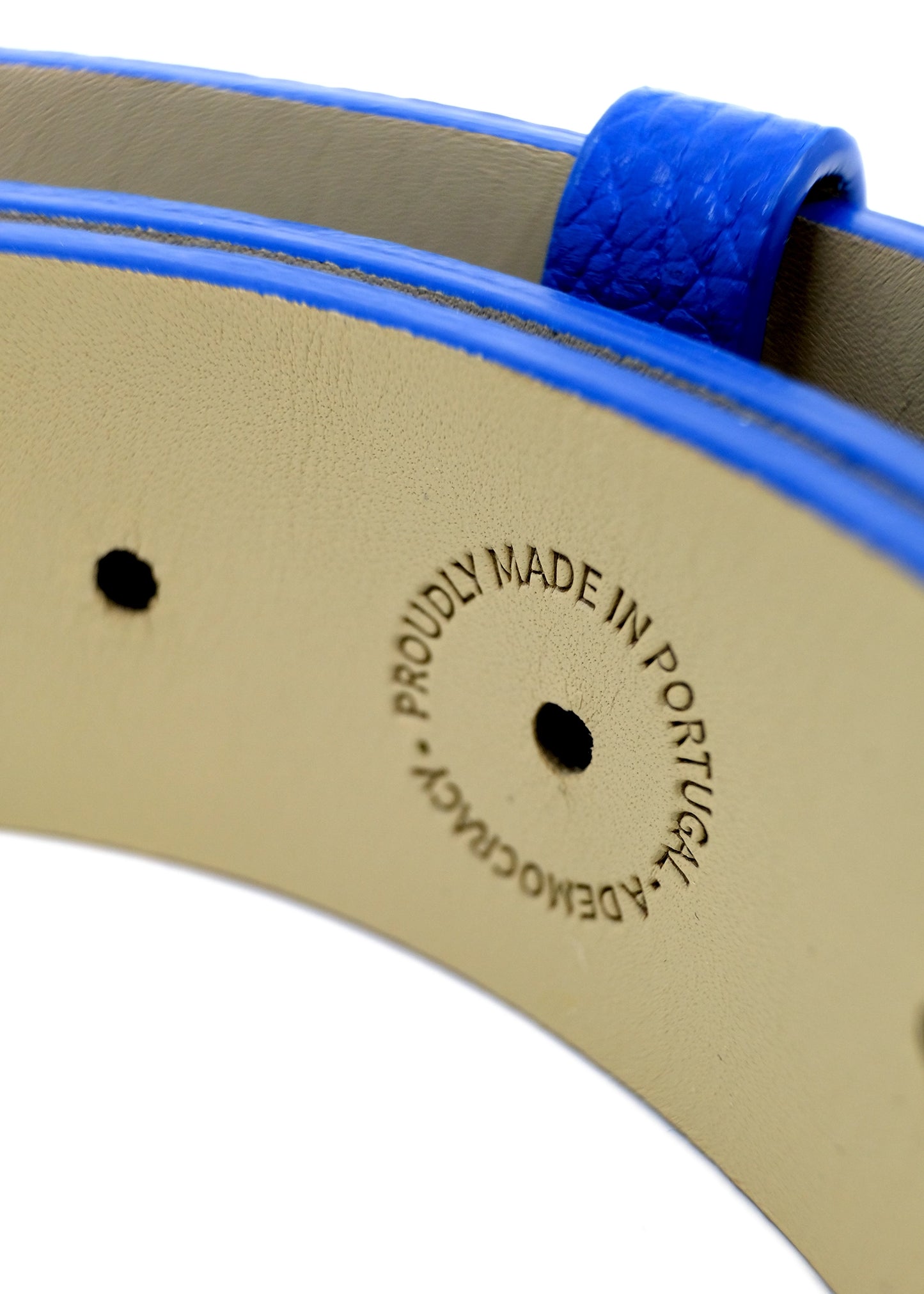 Close-up of the interior of a Betty Blue belt with a "PROUDLY MADE IN PORTUGAL - A DEMOCRACY" embossed stamp.