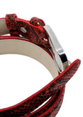 Detailed macro shot of the Blood Red belt’s silver-tone buckle, highlighting the logo and metallic finish.
