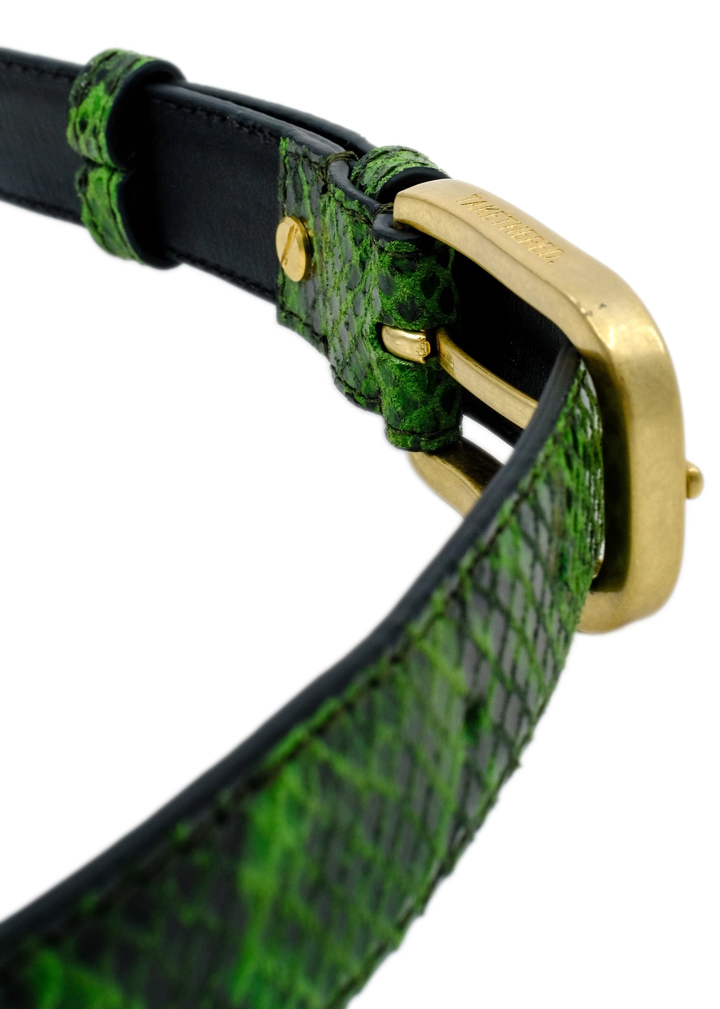 Angled close-up of the Atomic Green snakeskin belt, showing the gold buckle's side profile and textured edge.
