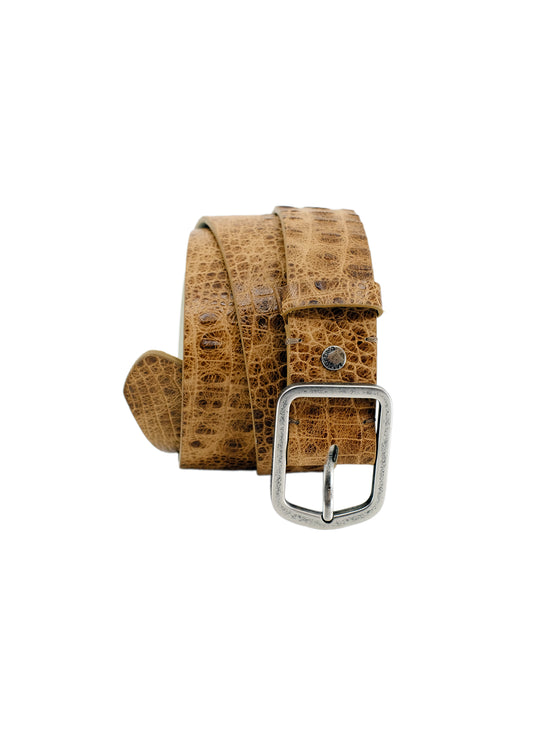 Vertical profile of the Dusty Spring crocodile embossed belt, coiled to show the silver buckle and the leather texture.