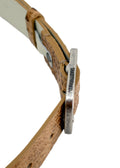 Side-view of the Dusty Spring crocodile embossed belt, highlighting the weathered silver buckle’s top edge and branding.
